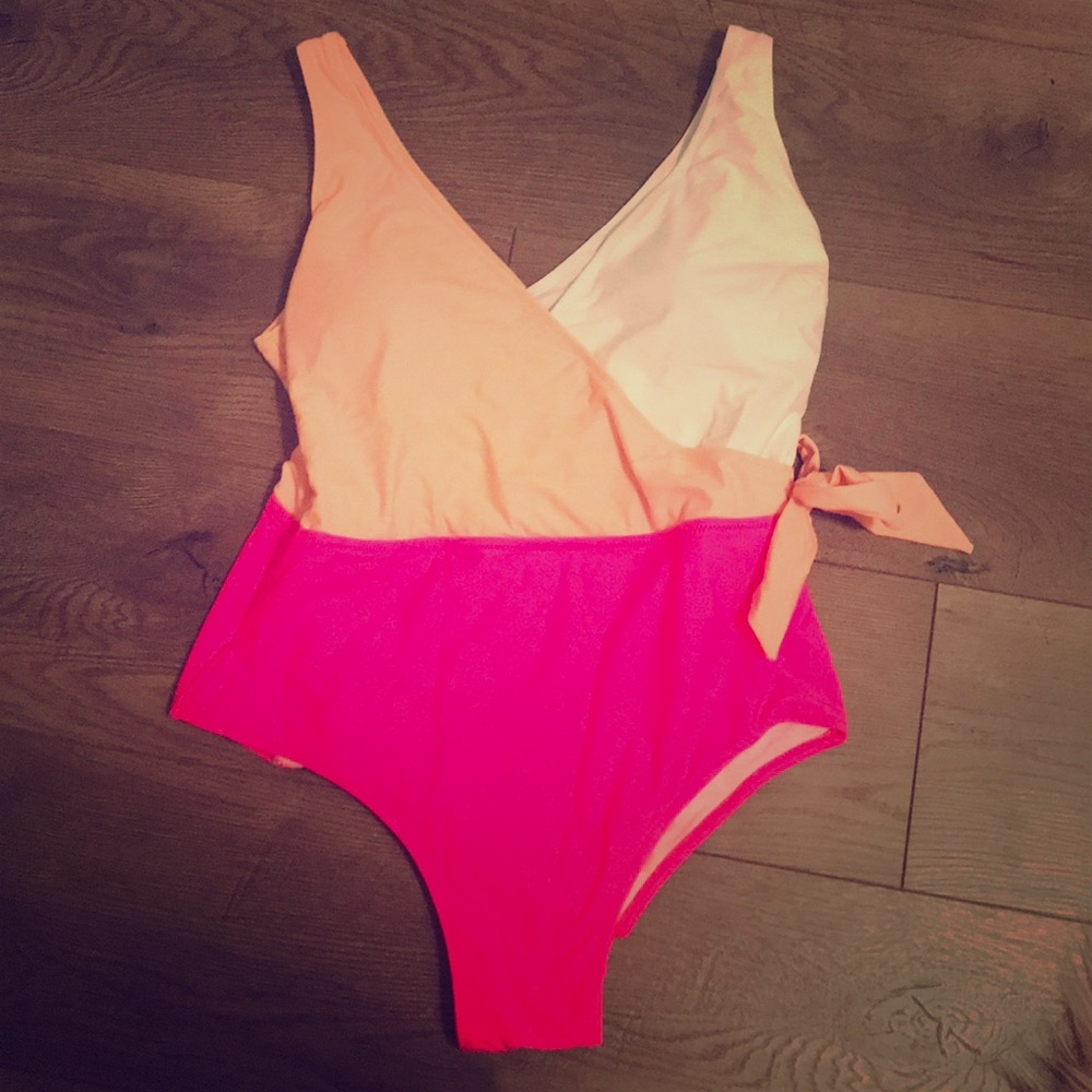 one piece. NEVER WORN